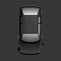 Small Modern Dark Gray Hatchback Car With Sleek Body And White Wheels On Reflective Surface