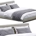 Modern Double Bed with Gray Upholstered Headboard White Gray Pillows and Gray Throw Blanket
