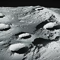 Rugged Lunar Surface Landscape Featuring Multiple Impact Craters and Rocky Terrain