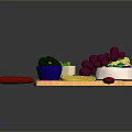 Assorted Cheese Platter with Grapes Blue Bowls on Wooden Cutting Board and Red Handle Knives