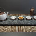 Traditional White Tea Set With Teapot Four Cups And Decorative Statue On Gray Background