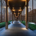 Modern Wooden Pergola With Lattice Screens And Warm Lighting Along Garden Pathway
