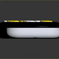 Television Remote Control With Black Body White And Yellow Buttons And Central OK Button Design