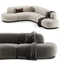Curved Sectional Sofa in Light Beige Dark Gray with Modern Design Pillows and Throw Blanket