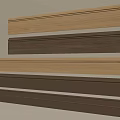 Decorative Wooden Molding Strips In Various Colors On Beige Wall