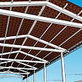 Modern Pergola Structure With Brown Tile Roof White Columns And Gray Floor Railings