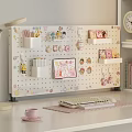 Cute Hanging Decorations on White Pegboard in Desk Workspace with Stationery Holders and Cartoon Charms