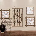 Elegant Wall Decor Featuring Decorative Frames With Floral Branch Patterns And Black Vase On Table 3d model