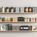 Various Tea Sets Packaging Displayed on Wooden Shelves with Chinese Labels and Colorful Designs