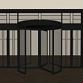 Modern Revolving Door With Black Frame And Glass Panels In Minimalist Interior