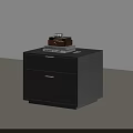 Modern Dark Wooden Bedside Table with Two Drawers and Decorative Items on Top