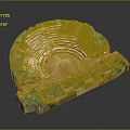 Ancient Amphitheater Ruins With Semicircular Stone Seats And Grass Covered Areas