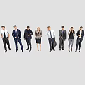 Group of Business Professionals in Formal Attire Standing Isolated on White