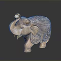 Handcrafted Wooden Elephant Figurine With Intricate Carved Patterns And Details