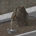 Garden Landscape with Natural Rock Fountain and Flowing Water in Pool