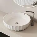 White Round Bathroom Sink With Fluted Edge And Silver Faucet Design