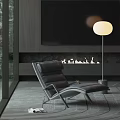 Modern Black Leather Lounge Chair in Stylish Interior with Fireplace Floor Lamp and Large Windows