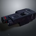 Black Durable Tactical Optical Device With Control Knobs And Red Accent