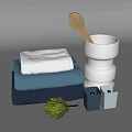 Stacked Colorful Towels Wooden Brush In White Holder With Small Candles And Green Artichoke
