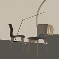 Modern Minimalist Dining Chairs With Floor Lamp Warm Lighting And Decorative Figurines