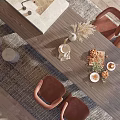 Cozy Restaurant Dining Table With Brown Chairs Cookies Tea Vase And Green Plants By Window