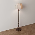 Classic Floor Lamp With Dark Wooden Twisted Pole And Light Colored Lampshade