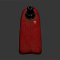 Red Plastic Jerry Can With Gray Spout And Metal Handle On Dark Surface