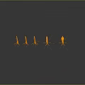 Five Orange Ant Shaped Decorative Figurines With Reflections On Gray Surface