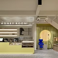 Honey Room Dessert Shop With Yellow Counter Display Cases And Blue Figure