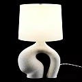 Modern Minimalist Table Lamp With Curved Sculptural Textured Ceramic Base And Beige Fabric Shade