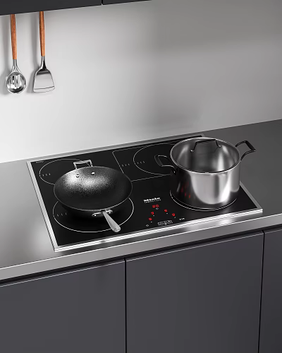 Modern Kitchen Cookware Display With Black Wok And Stainless Steel Pot On Induction Cooktop 3d model