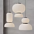 Modern Paper Pendant Lights With Various Shapes White Shades Dark Bases Hanging On Gray Wall