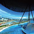 Modern Waterfront Lounge With Panoramic City View Infinity Pool White Sofa And Rain Curtain