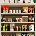 Organized Pantry Shelf Stocked with Various Food Boxes Cans and Jars