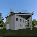 Modern Industrial Factory Building With External Stairs Yellow Railings Green Lawn And Trees
