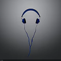 Blue Over Ear Headphones With Black Ear Cups And Wired Cable