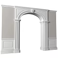 White Arched Doorway With Decorative Columns Light Colored Walls And Moldings
