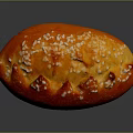 Appetizing Red Sesame Seed Bread With Golden Crust And Decorative Slits
