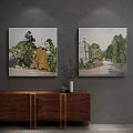 Landscape Wall Art Paintings Featuring Trees Houses Road Hanging on Gray Wall Above Wooden Cabinet