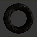 Used Car Tire With Worn Tread And Dark Surface On Gray Background