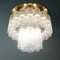 Modern Transparent Glass Chandelier With Layered Design And Golden Circular Base