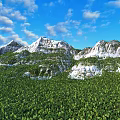 Beautiful Natural Mountain Landscape With Snowcapped Peaks Lush Green Forest Blue Sky With Floating Clouds
