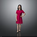 Elegant Woman Standing In Red Dress With Gray Background And Hand On Hip