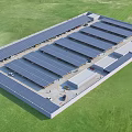 Solar Powered Parking Lot With Rooftop Solar Panels Surrounded by Green Grass