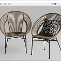 Rattan Outdoor Chairs With Black Metal Legs And Geometric Pattern Cushion