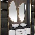 Modern Bathroom Vanity With Double White Sinks And Gold Framed Oval Mirrors