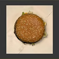 Delicious Hamburger With Sesame Bun Lettuce And Patty On White Paper