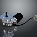 Electric Motor With Silver Metal Housing Black Cylindrical Body And Wiring Harness Connector
