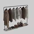 Stylish Hangers Holding Neutral Tones Coats And Shirts In Modern Wardrobe