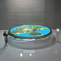 Art Installation Circular Reflective Design With Detailed City Model In Indoor Space With Person Observing